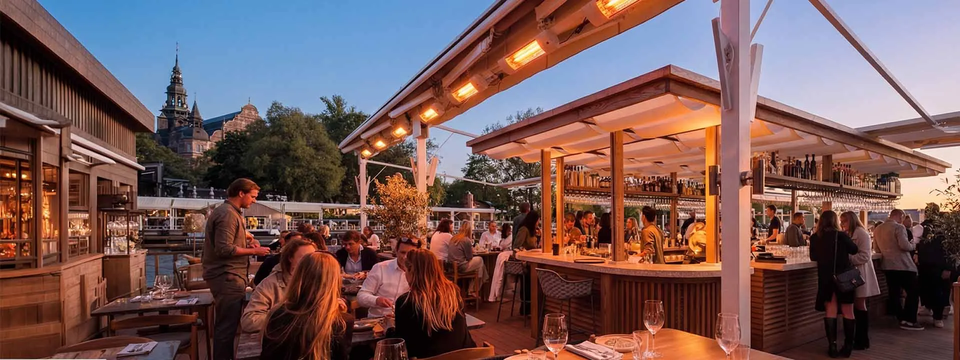 Outdoor infrared heater PRO V70 installed at a restaurant terrace